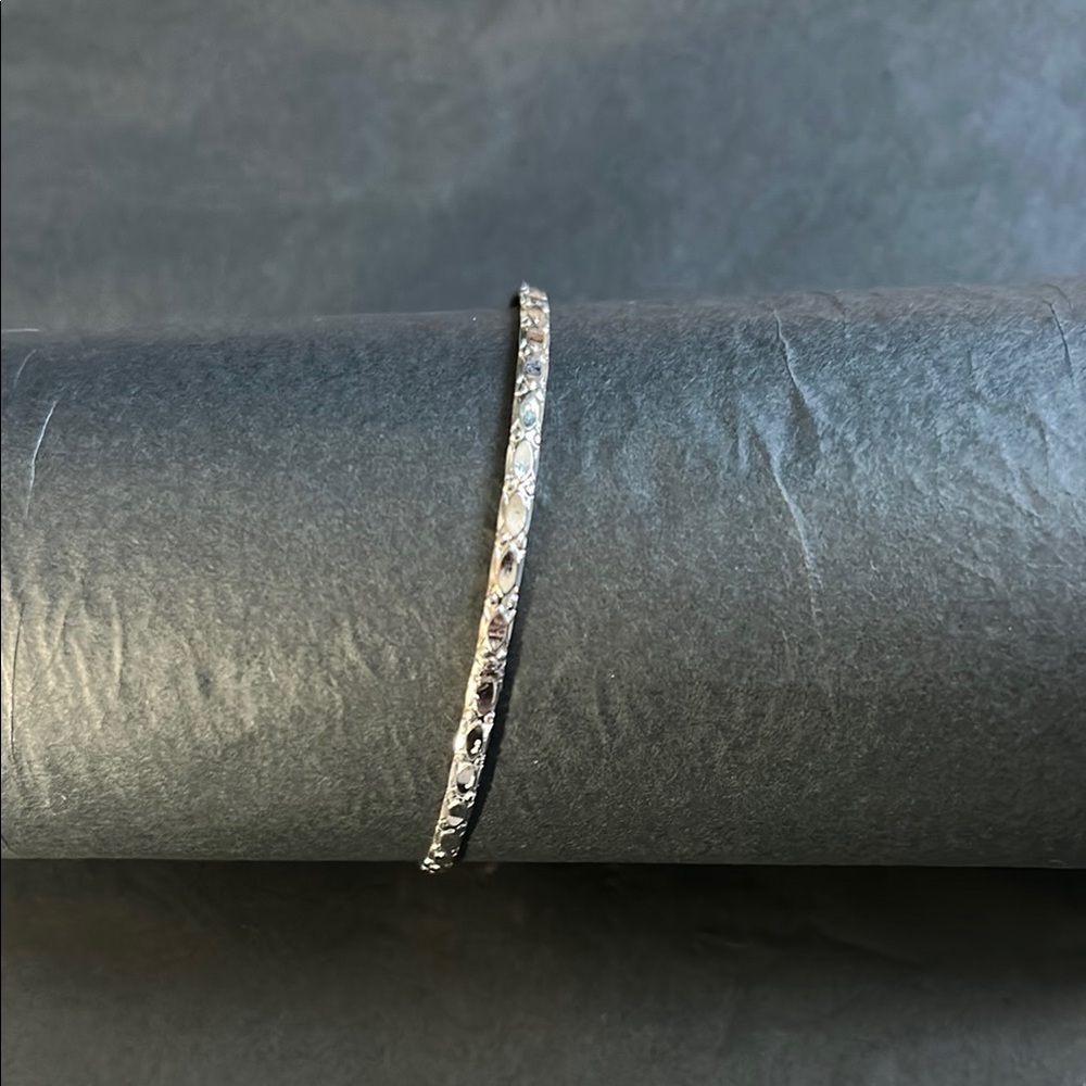 Elegant Silver Bangle Bracelet With Detail